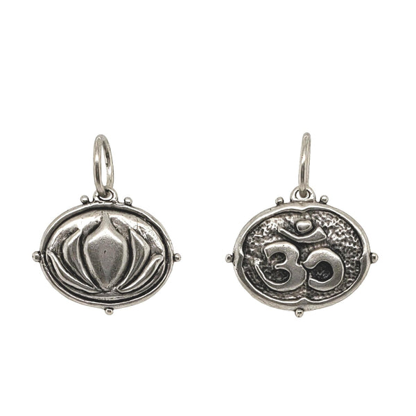 lotus + om double sided charm shown in oxidized sterling silver #co85-0