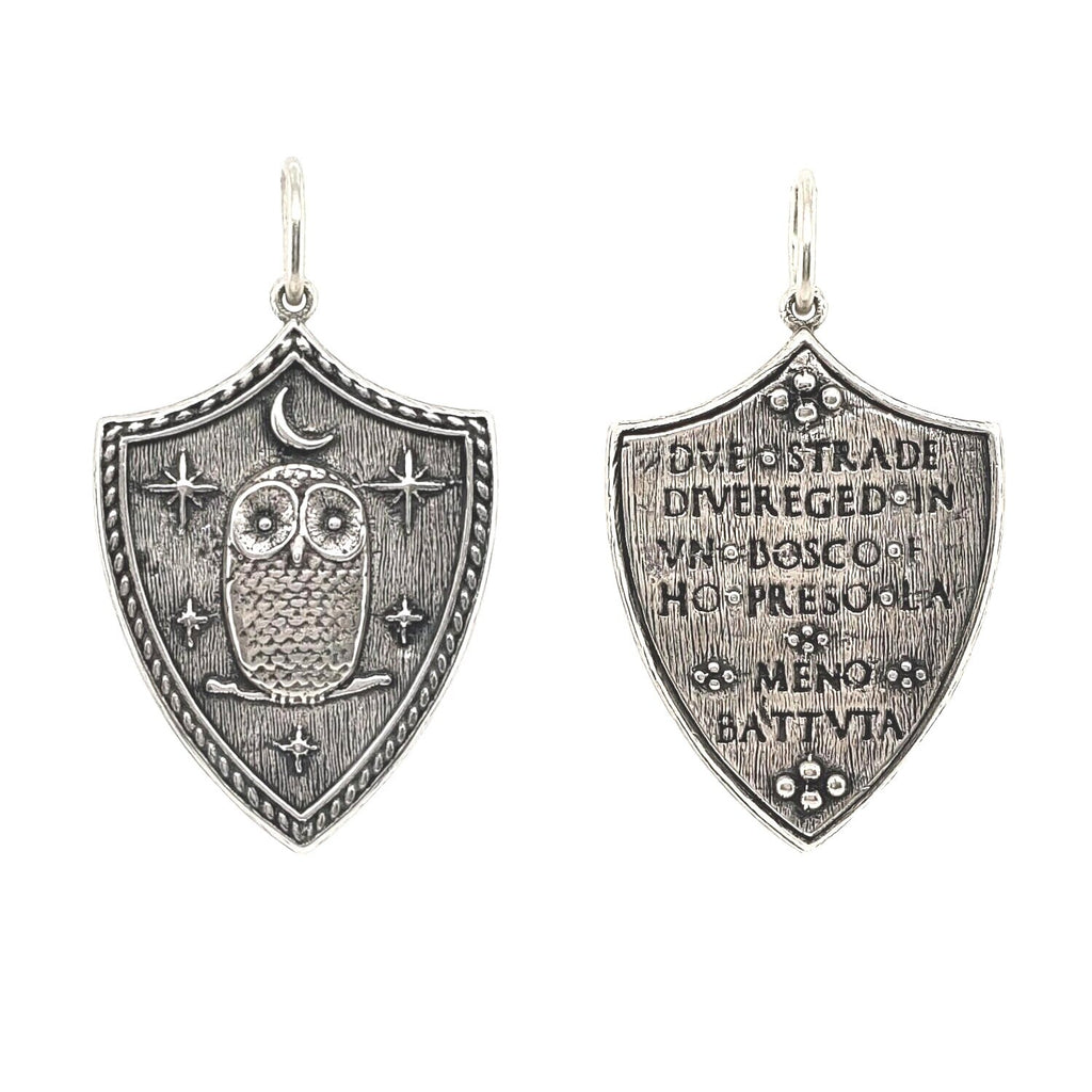 large shield with owl, moon & stars reads "Two roads diverged in a wood & I took the one less traveled"  by Robert Frost shown in oxidized sterling silver #c195-0