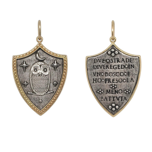large shield with owl, moon & stars reads "Two roads diverged in a wood & I took the one less traveled" by Robert Frost shown in oxidized sterling silver with 18k gold rim & bail  #c195c