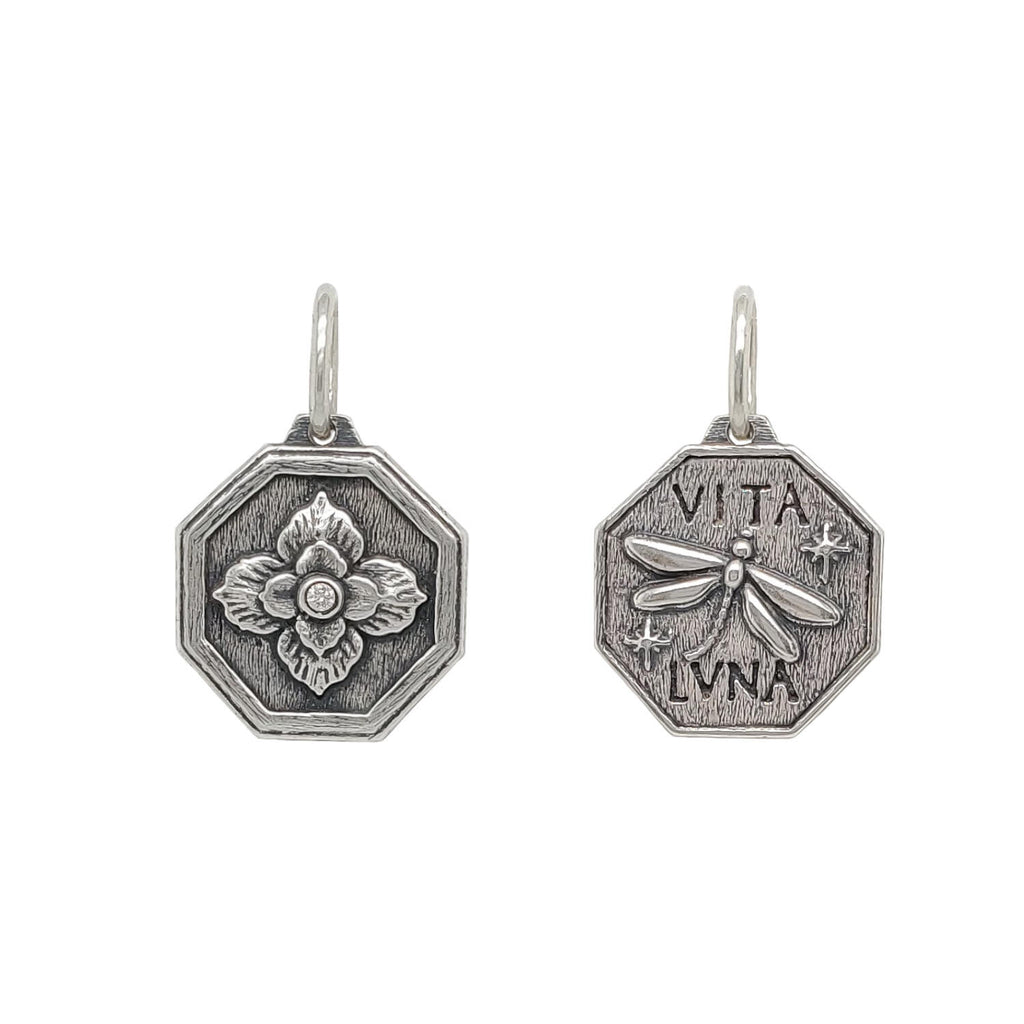small Latin hexagon with ornate clover + dragonfly with white diamond .02cts (1) center of flower reads "crazy life" shown in oxidized sterling  silver #c218-2