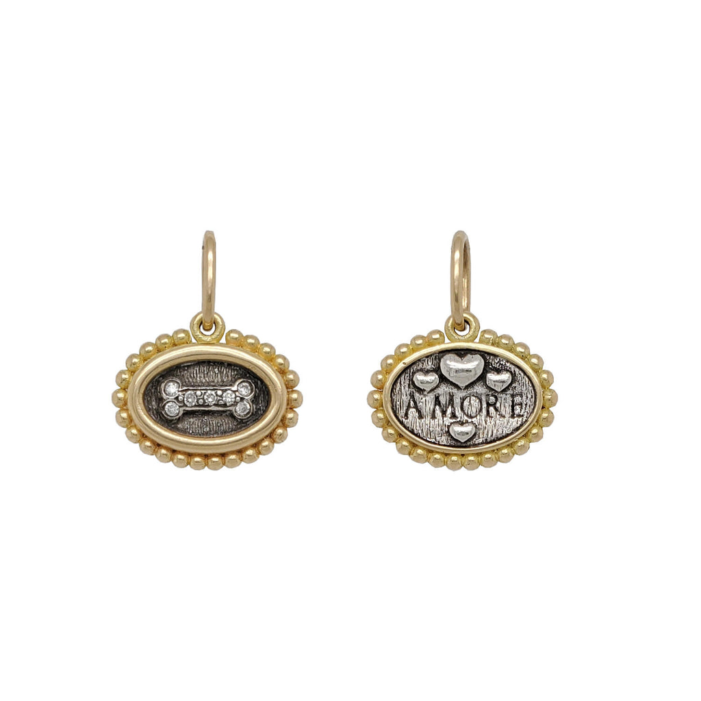 oval dog bone + amore double sided charm with white diamonds .056cts on bone in oxidized sterling silver with 18k gold rim & bail  #c235d