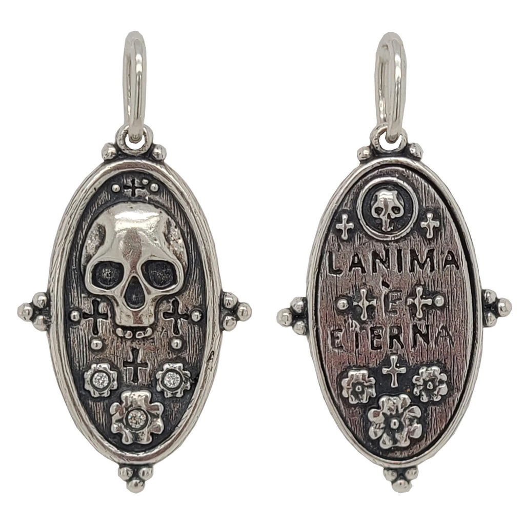 skull + flowers double sided charm with white diamonds .015cts on flowers reads "the soul is eternal" shown in oxidized sterling silver #c263-2