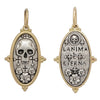 skull + flowers double sided charm reads "the soul is eternal" shown in oxidized sterling silver with 18k gold rim & bail #c263c