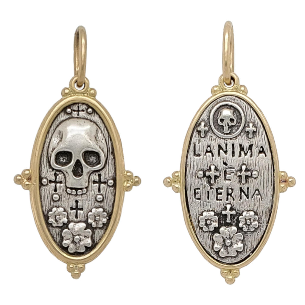 skull + flowers double sided charm reads "the soul is eternal" shown in oxidized sterling silver with 18k gold rim & bail #c263c