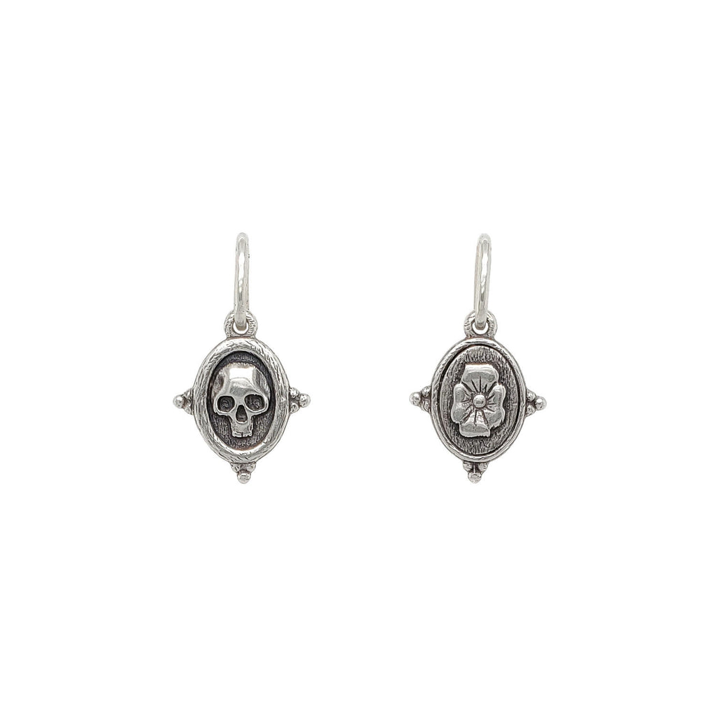 baby skull + flowers double sided charm shown in oxidized sterling silver #c266-0