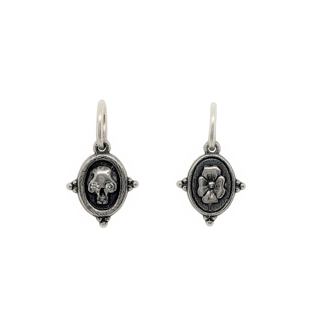 baby skull + flowers double sided charm with white diamond .026cts eyes shown in oxidized sterling silver #c266-2