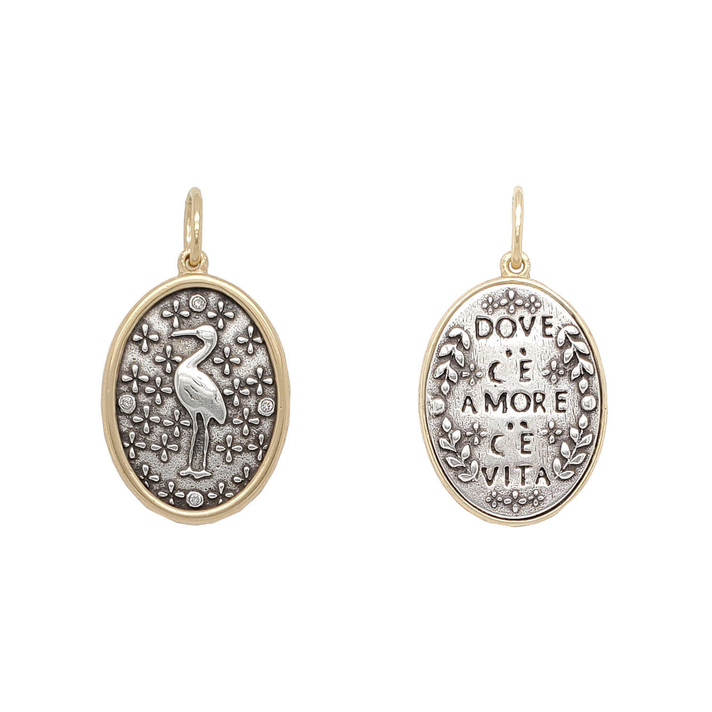 Ibis double sided charm with diamond .032cts dots on Ibis side reads "Where there is love there is life" by Mahatma Gandhi. Shown in oxidized sterling silver with 18k gold rim & bail #c268d