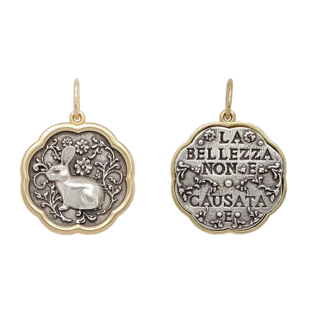 medium floral rabbit double sided charm reads "Beauty is not caused, it is" by Emily Dickinson. Shown in oxidized sterling silver with 18k gold rim & bail #c330c