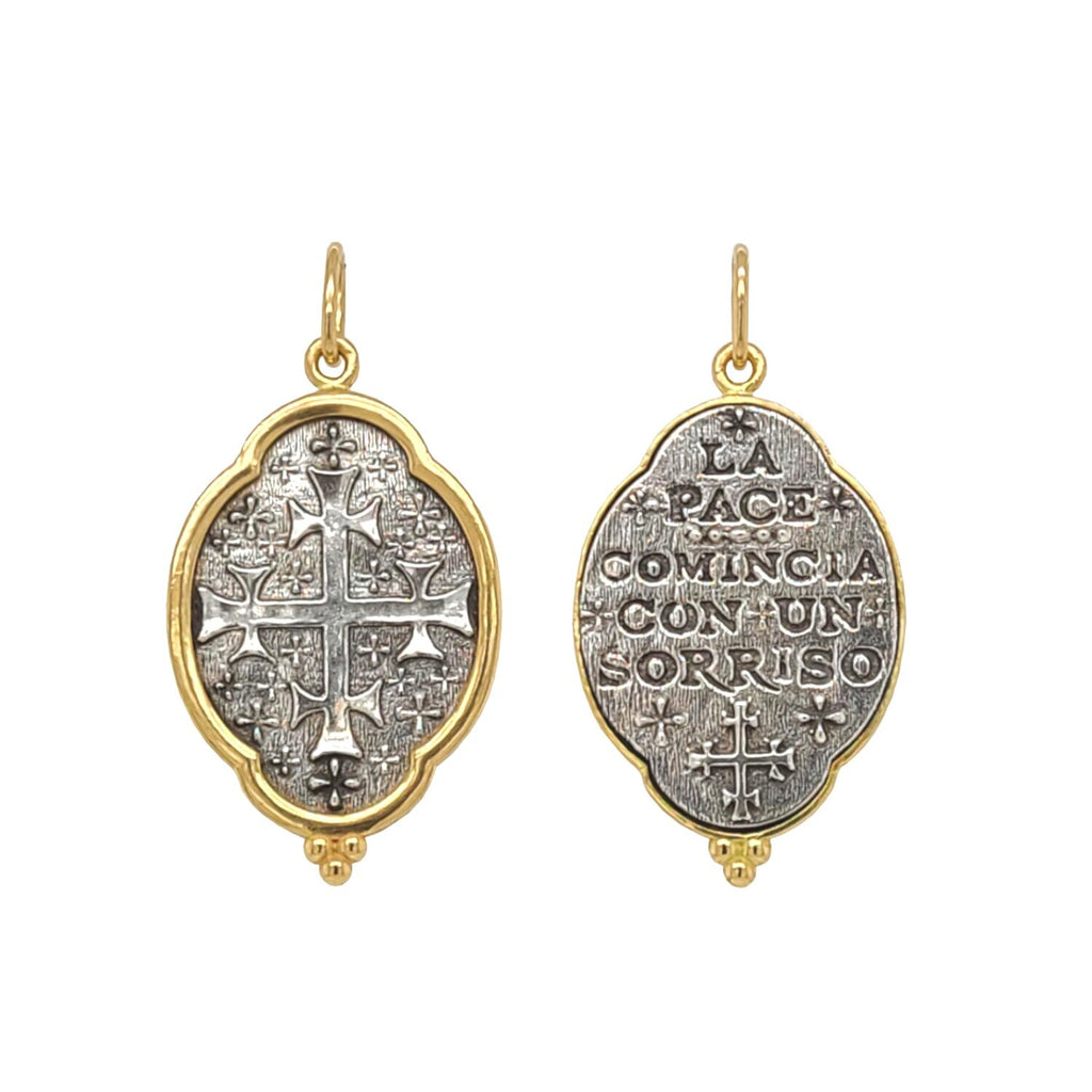 elongated large fancy oval double sided cross charm reads "Peace begins with a smile" Mother Theresa. Shown in oxidized sterling silver with 18k gold rim & bail #c336c