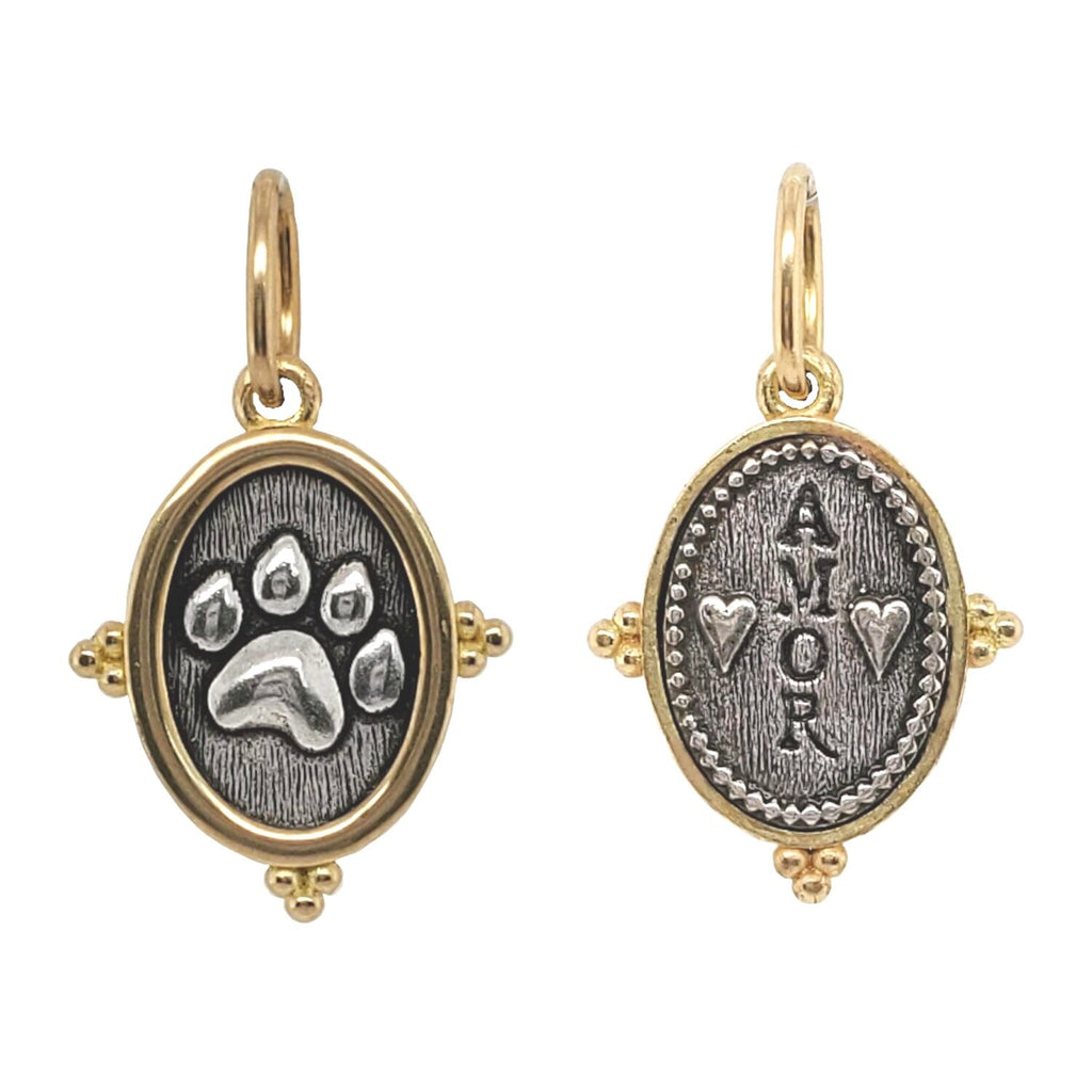 kitty paw double sided charm reads "love" shown in oxidized sterling silver with 18k gold rim & bail #c339c