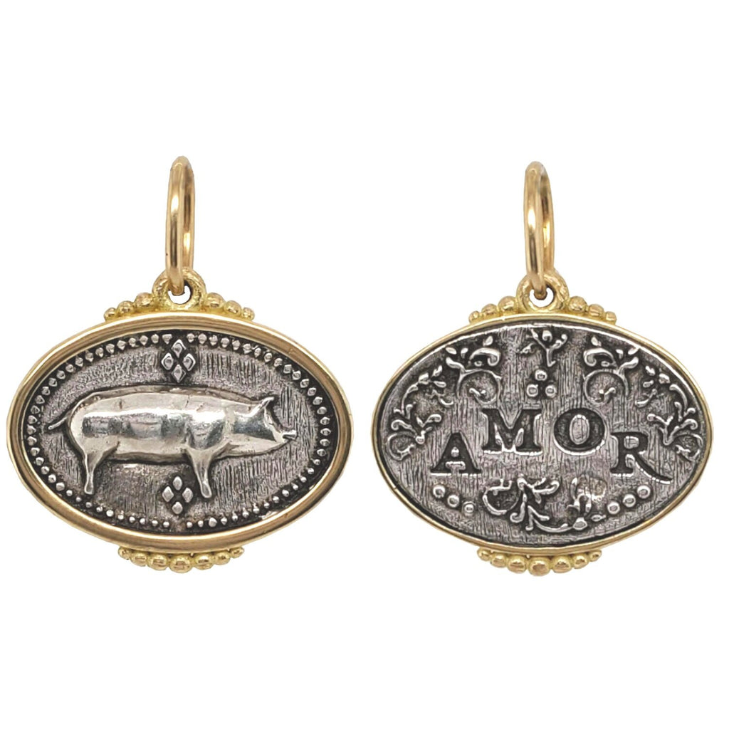 double sided small oval pig "Stanley" reads "love" shown in oxidized sterling silver with 18k gold rim & bail #c340c