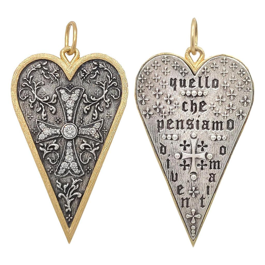 medium slim floral double sided heart charm with diamond .48cts cross reads "she flies with her own wings". Shown in oxidized sterling silver with 18k gold rim & bail #c347d