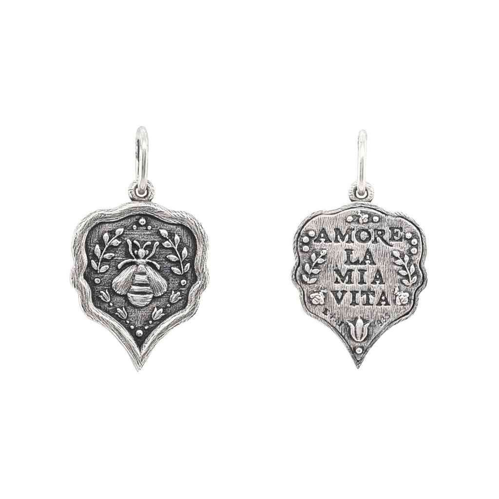 small ornate pointy double sided bee charm reads "I love my life" shown in oxidized sterling silver #c361-0