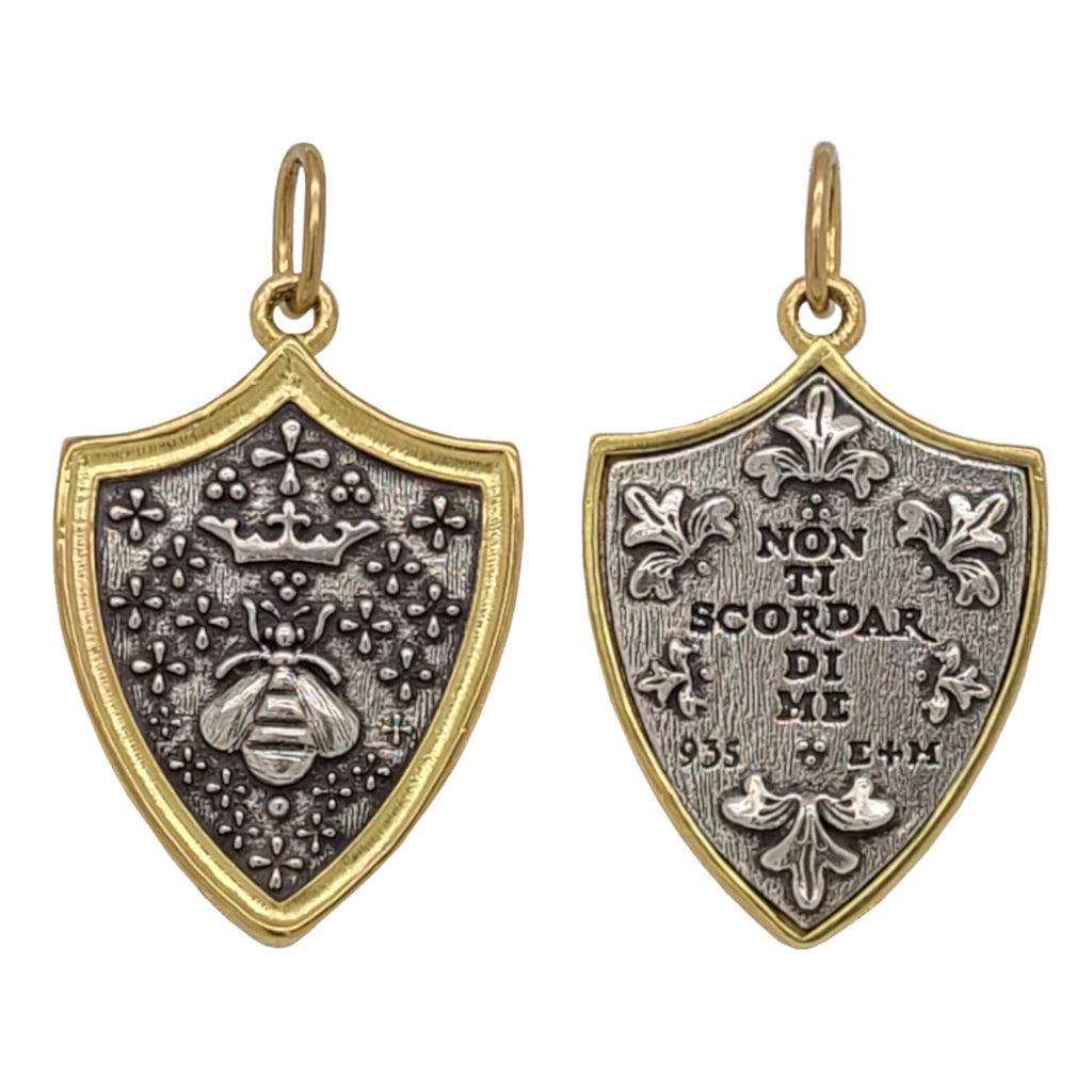 medium queen bee double sided charm reads "forget me not" shown in oxidized sterling silver  with 18k gold rim & bail #c379c