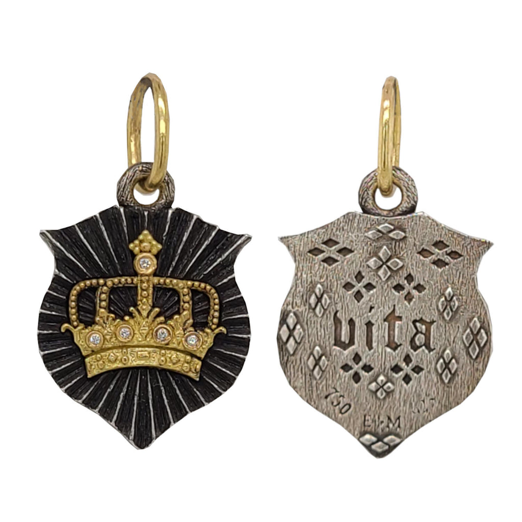small double sided ruche shield + crown charm with white diamonds .01cts on crown reads "life" shown in oxidized sterling silver with 18k gold crown & bail #c413d