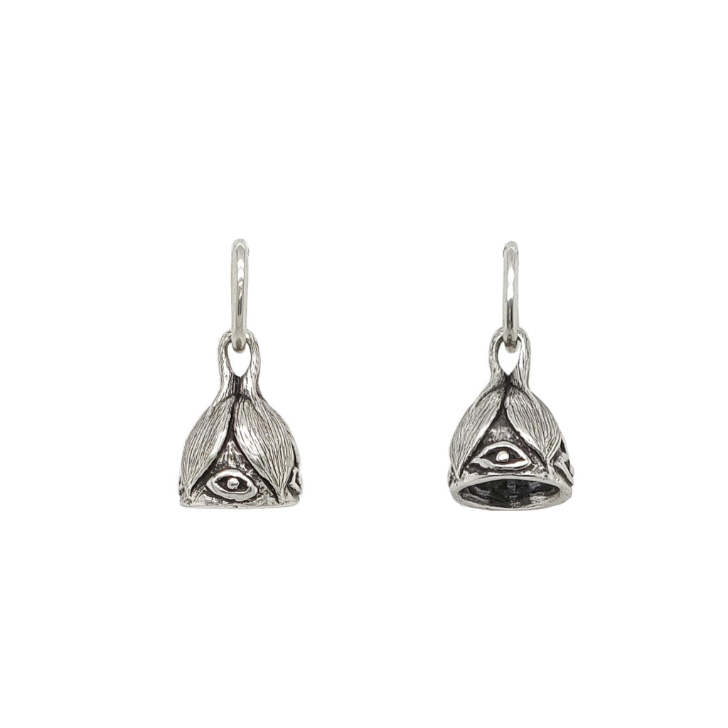 lotus + evil eye bell charm shown in oxidized sterling silver #co31-0
