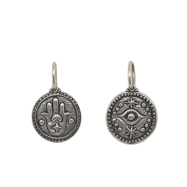 evil eye + hamsa double sided charm shown in oxidized sterling silver #co69-0